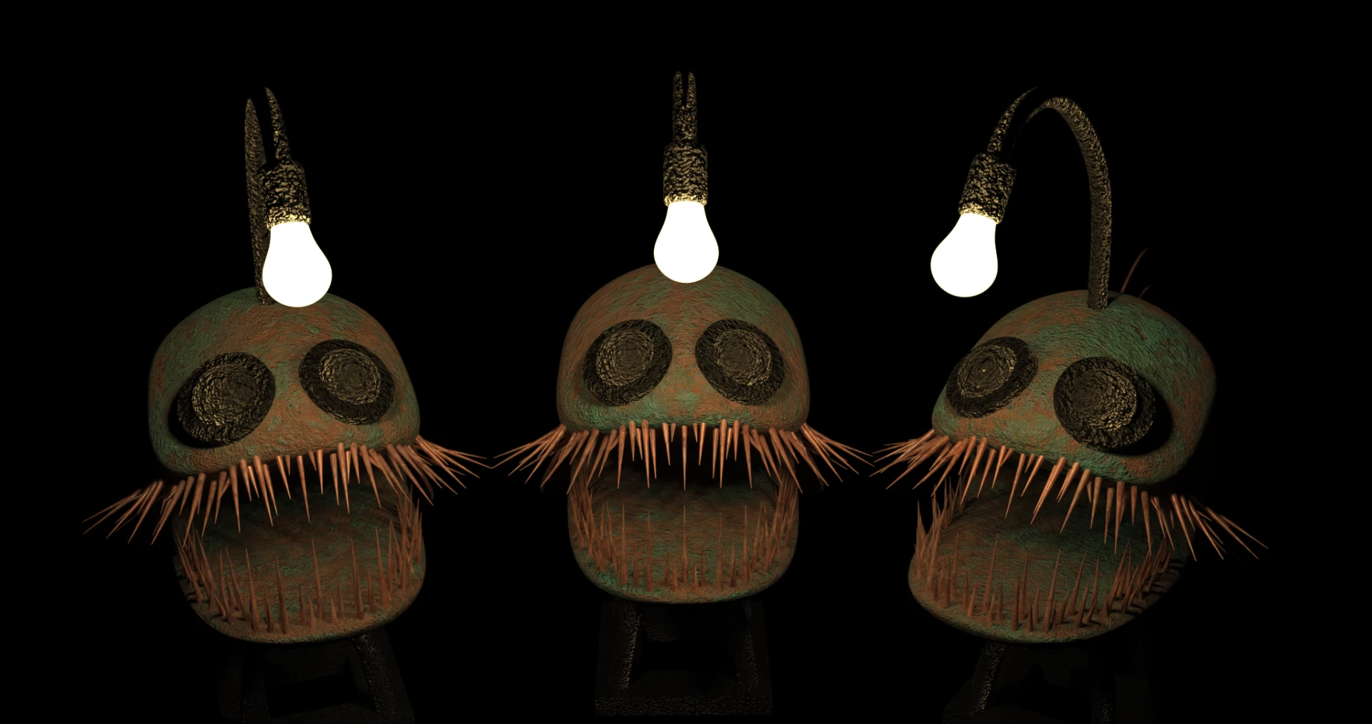 Three angler fish lamps with glowing bulb lures
