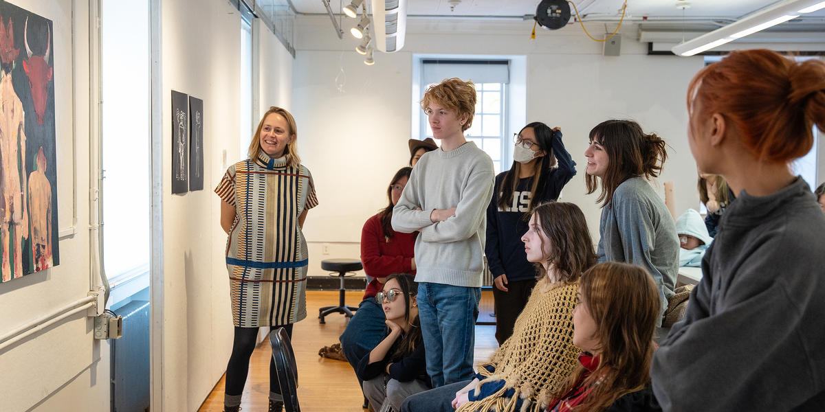 Design students participating in a classroom critique
